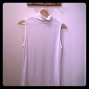 Cute white sleeveless mock neck top